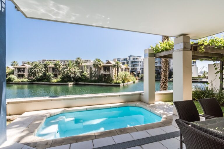 Canal side patio and pool