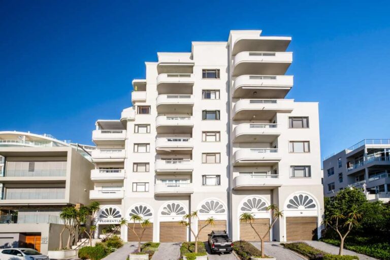 Modern apartment building exterior with private balconies at Aretzi