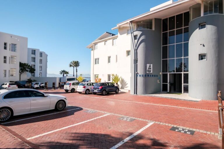 Exterior view of the modern Stonewood apartment building with secure parking