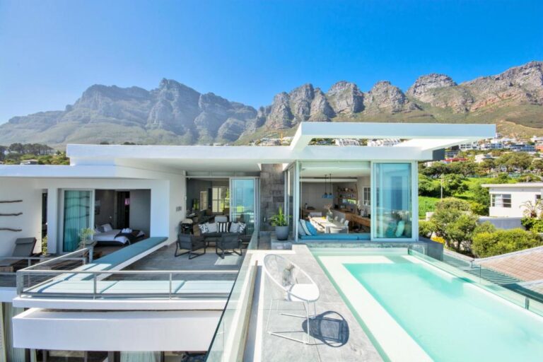 Striking modern villa with pool and mountain backdrop at Atlantic Reflection