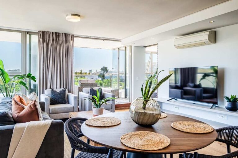 Open-plan living and dining area with garden views at Tramonto