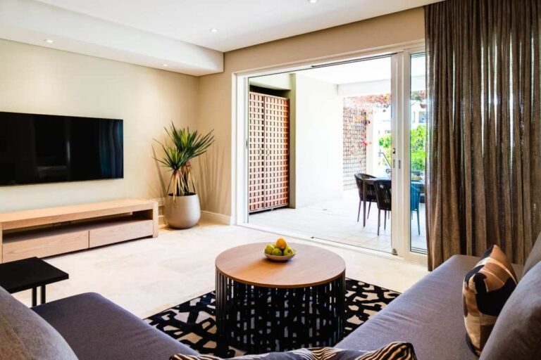 Chic lounge area with direct terrace access at Altmore 001