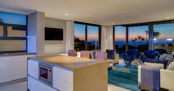 lower-level-kitchen-and-lounge-at-night