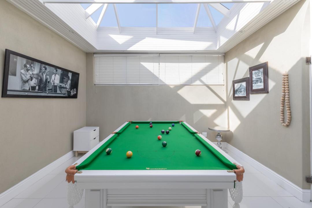 Bright entertainment room with skylight and pool table Villa Galazzio