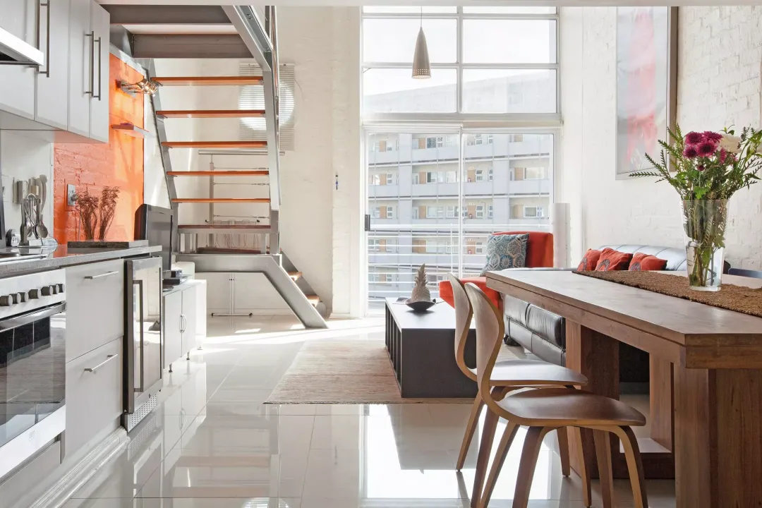 Stylish double-volume living space with natural light at 14 Harbour Terrace