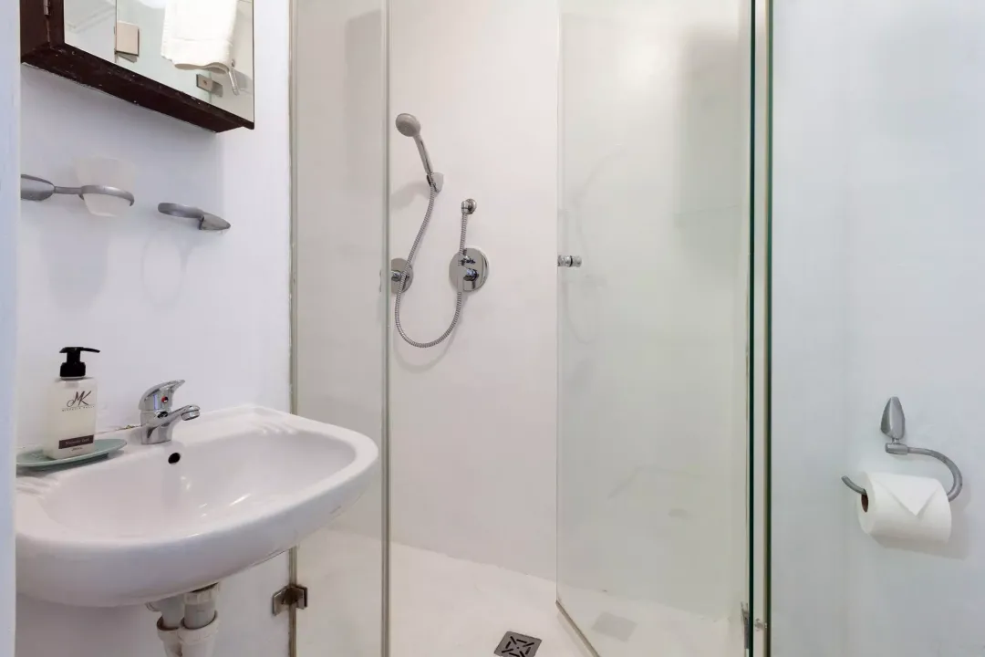 Modern glass-enclosed shower at 14 Harbour Terrace