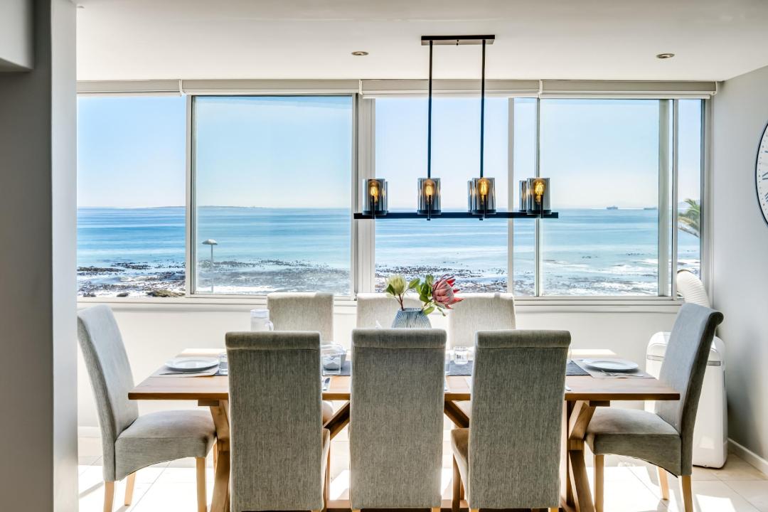 Elegant dining area with full ocean views at Atlantic Views
