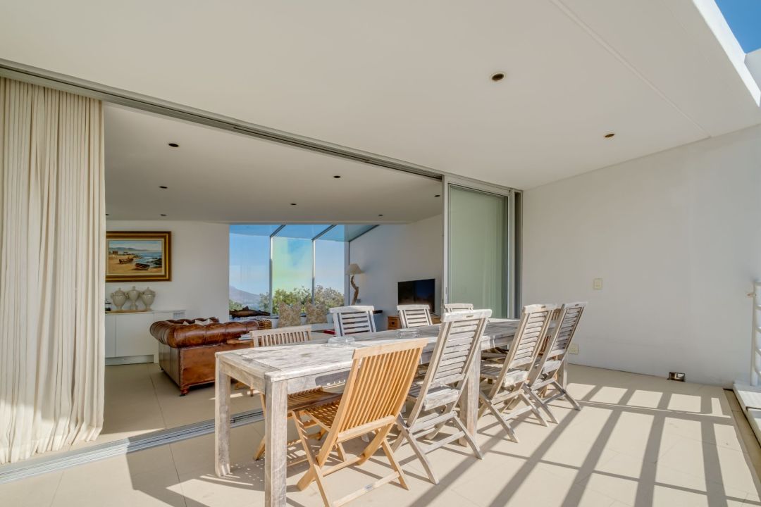 Spacious terrace with outdoor dining and seamless indoor-outdoor flow at Silvertree