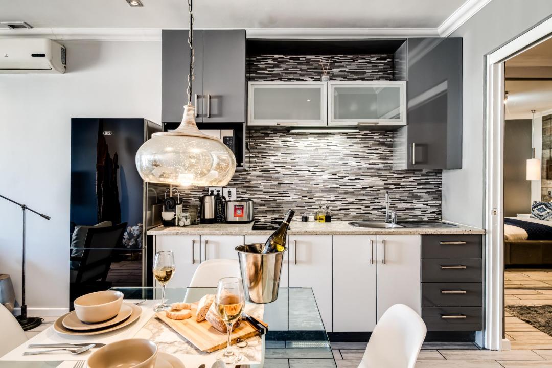 Stylish compact kitchen and dining area with modern finishes at Stonewood