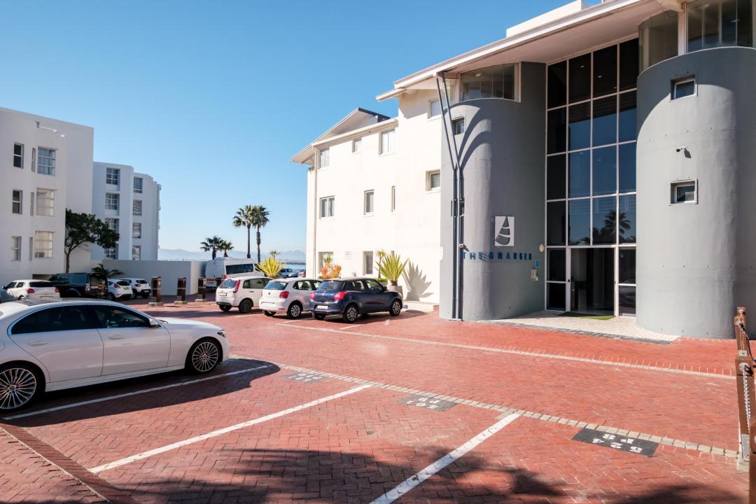 Exterior view of the modern Stonewood apartment building with secure parking