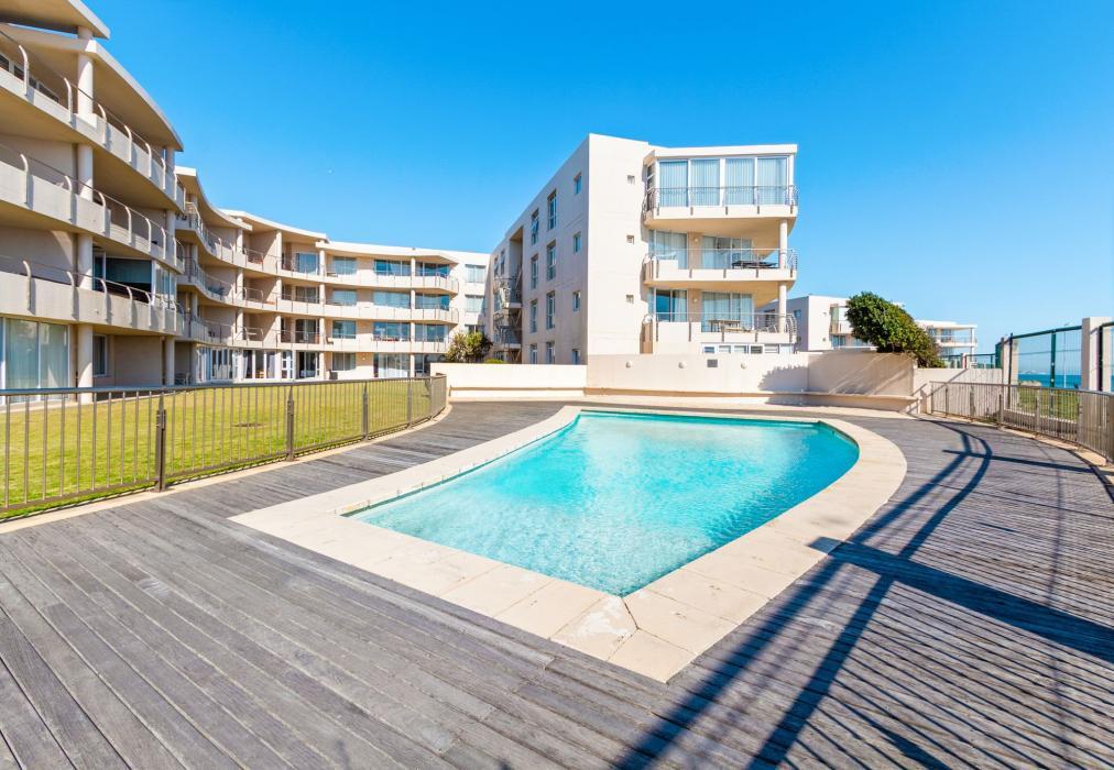 Communal Pool with Sun Deck and Ocean Views at Lagoon Beach 29A
