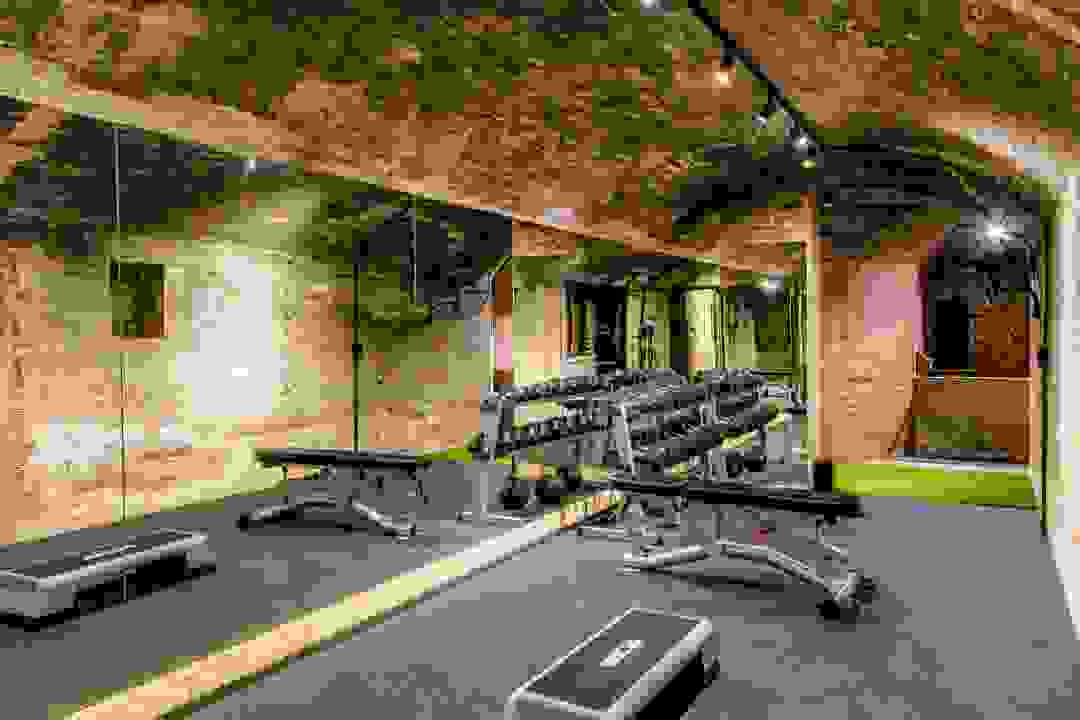 Designer fitness studio with full-length mirrors at Marula One