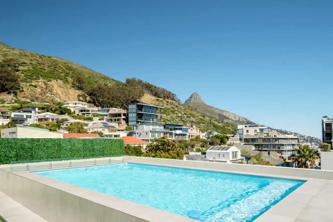 Rooftop pool with mountain views at Marula One