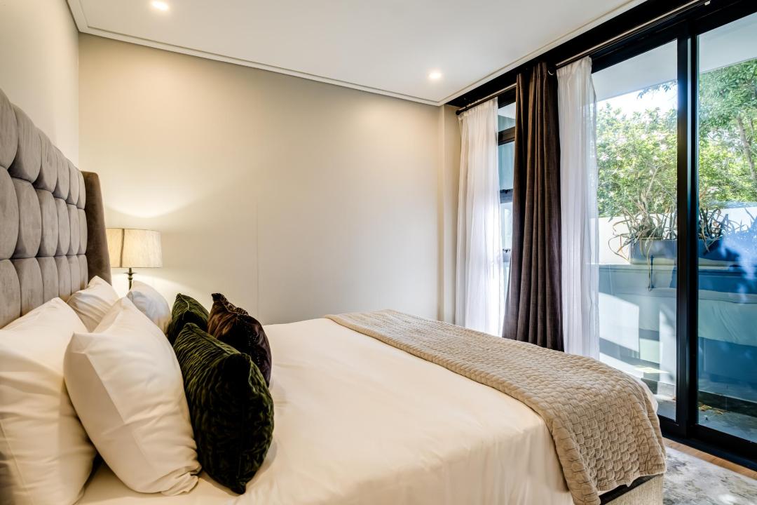 Peaceful bedroom with garden access at Bantry Suite