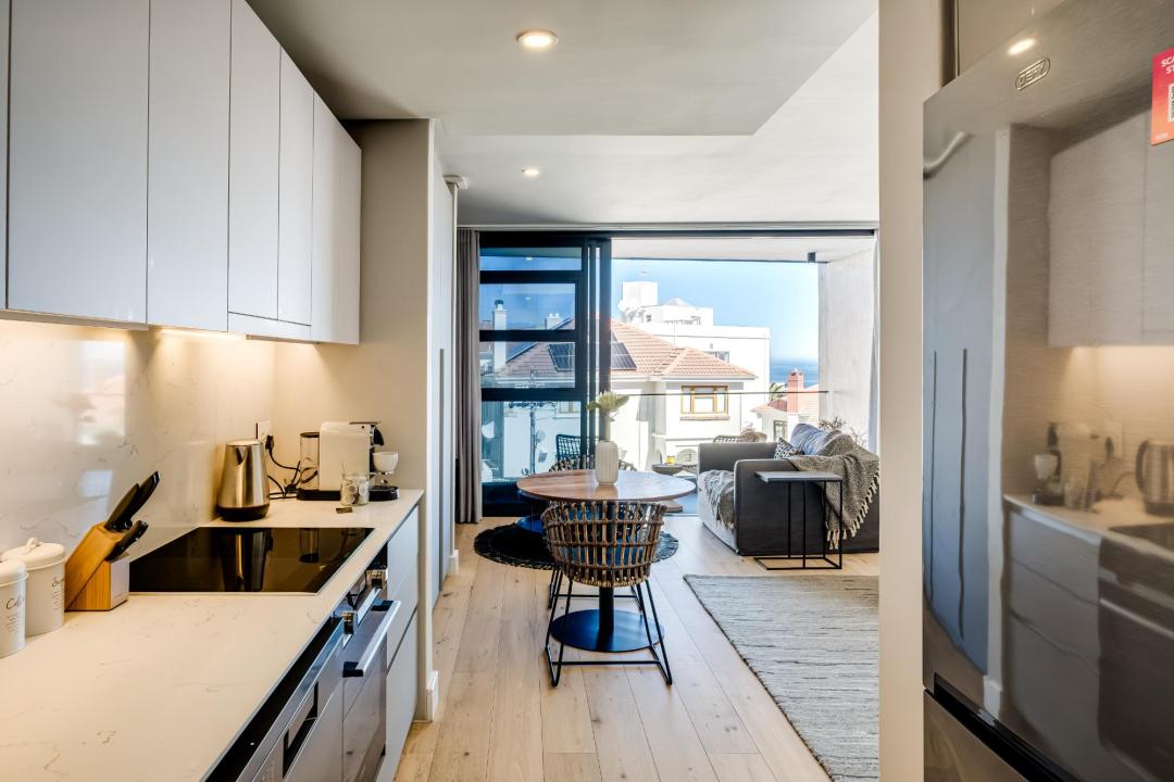 Open-plan kitchen and living area with natural light at Bantry Pad