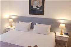 Comfortable King Bedroom with Soft Lighting at KiteSky Langebaan