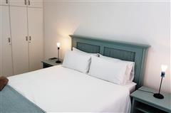 Serene Queen Bedroom with Coastal Accents at KiteSky Langebaan