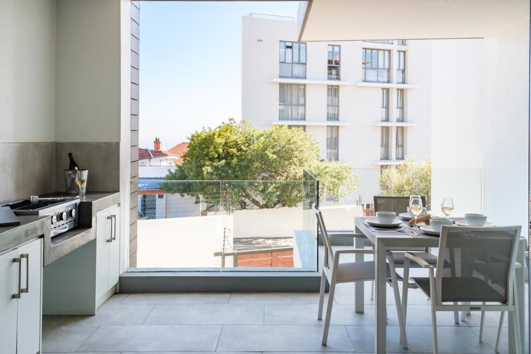 Stylish Balcony with Built-In Braai and Urban Views at Nobelium
