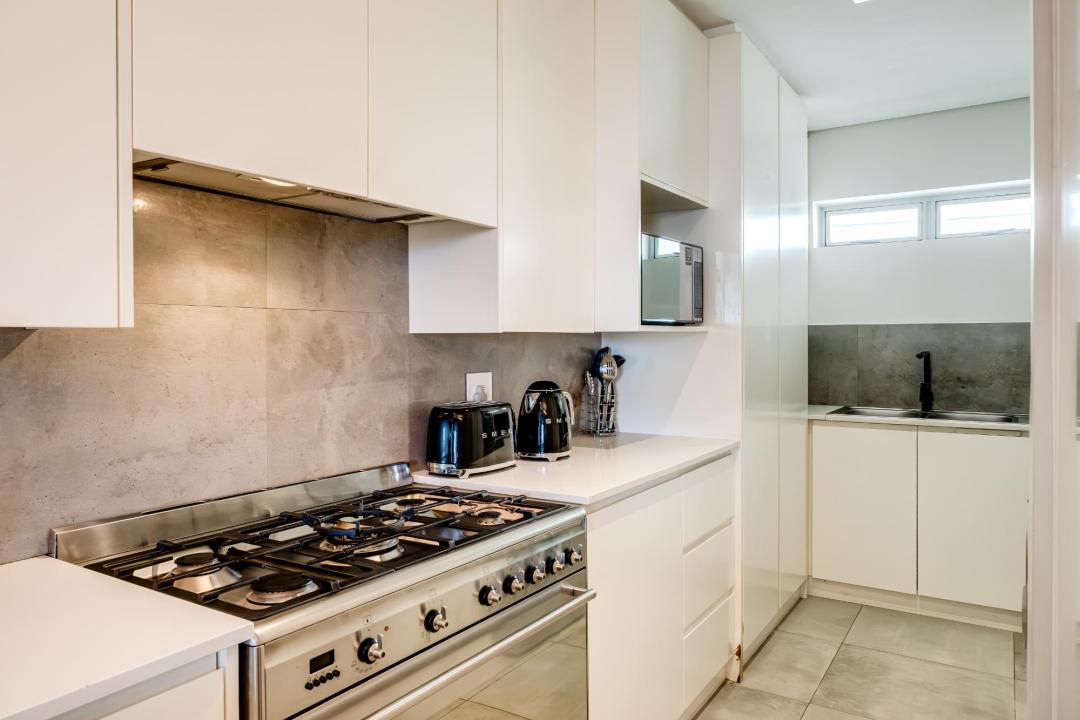 Sleek Modern Kitchen with Gas Hob and High-End Appliances at Nobelium