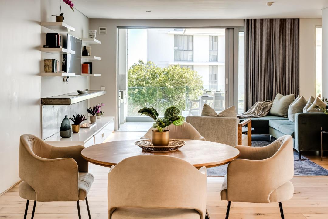 Stylish Open-Plan Dining and Lounge with Balcony Access at Nobelium